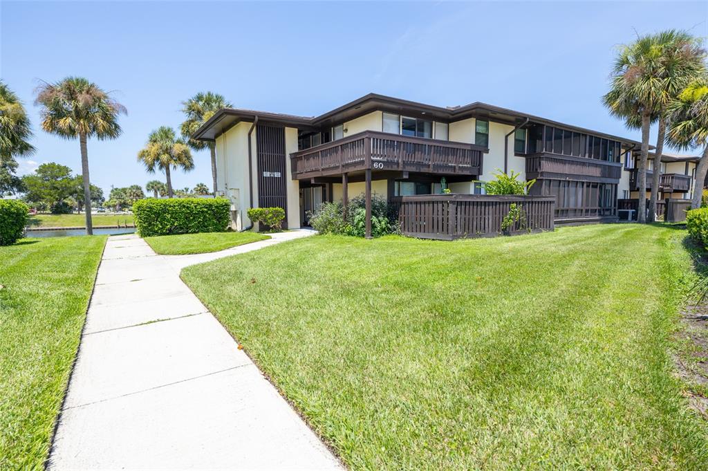 60 CLUB HOUSE DRIVE UNIT 208, PALM COAST, FL — photo 2 of 30
