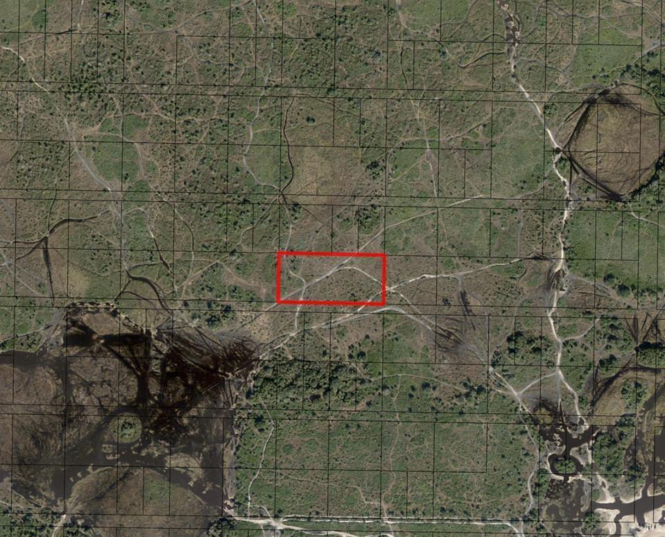 An aerial map view showing a rectangular plot of land highlighted in red — 0 NW 308th Street, Okeechobee FL 34972, OKEECHOBEE, FL
