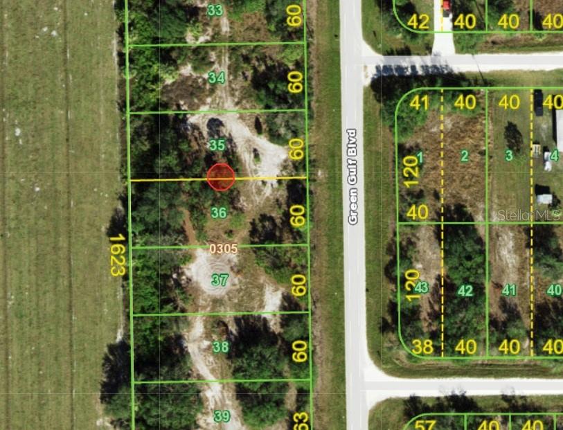 This is a satellite map showing a series of numbered land parcels along a road — 13441 GREEN GULF BOULEVARD, PUNTA GORDA, FL