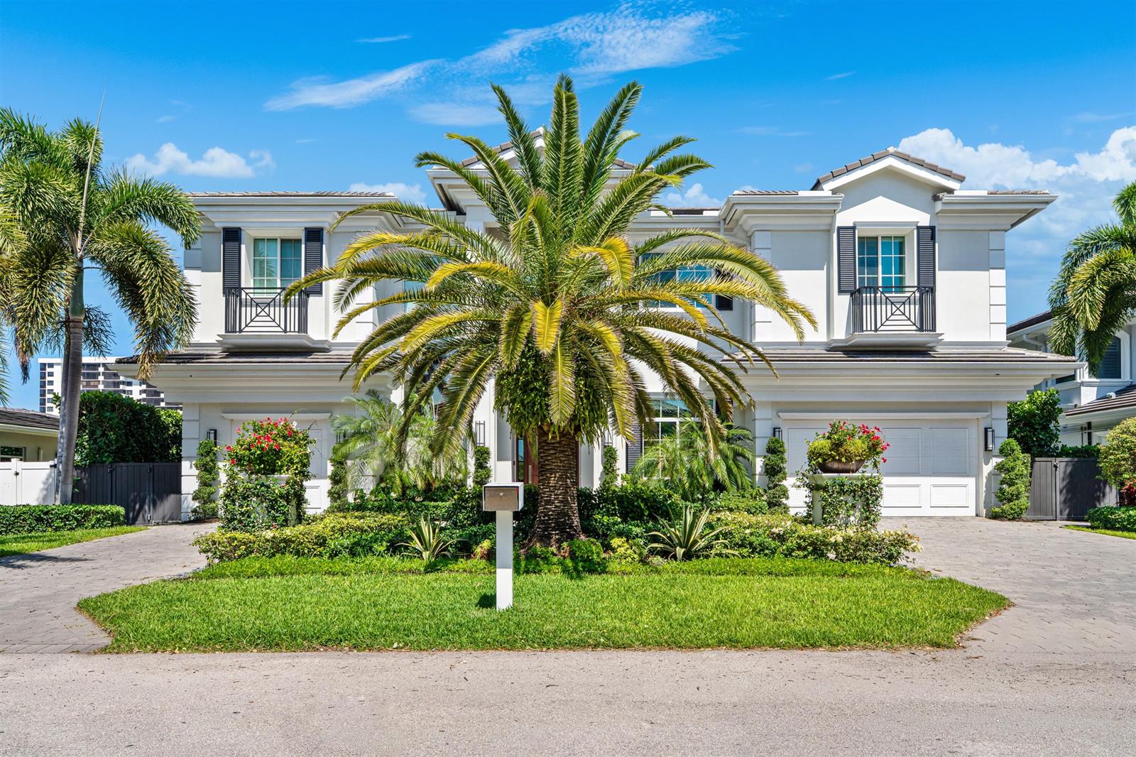 A two-story white house with a large palm tree in the front yard — 7212 NE 8th Drive, Boca Raton FL 33487, BOCA RATON, FL