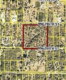 This is an aerial map view of a square plot of land outlined in red — 19680 NW 296th Street, Okeechobee FL 34972, OKEECHOBEE, FL