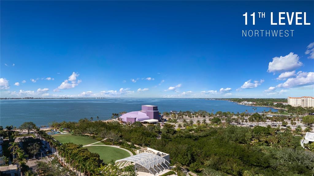 This floor plan shows a two-bedroom apartment with a large terrace and an open kitchen — 1000 BOULEVARD OF THE ARTS UNIT 1005, SARASOTA, FL