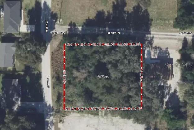 An aerial view shows a rectangular, wooded vacant lot outlined in red — TBA SE 145TH PLACE, SUMMERFIELD, FL
