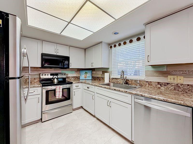 2210 UTOPIAN DRIVE E UNIT 214, CLEARWATER, FL — photo 4 of 30