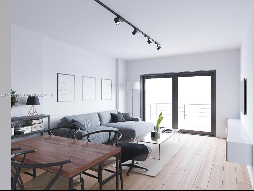 This is a rendering of a modern living and dining area with light wood floors — 401 Ocean Dr # 224, Miami Beach FL 33139, MIAMI BEACH, FL