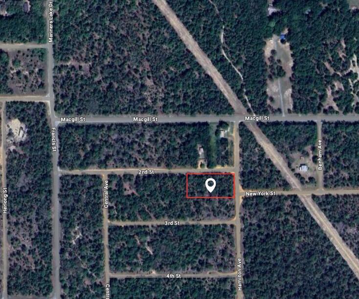 This is an aerial map showing a rectangular plot of land outlined in red — 00 2nd Street, FL 32148, FL