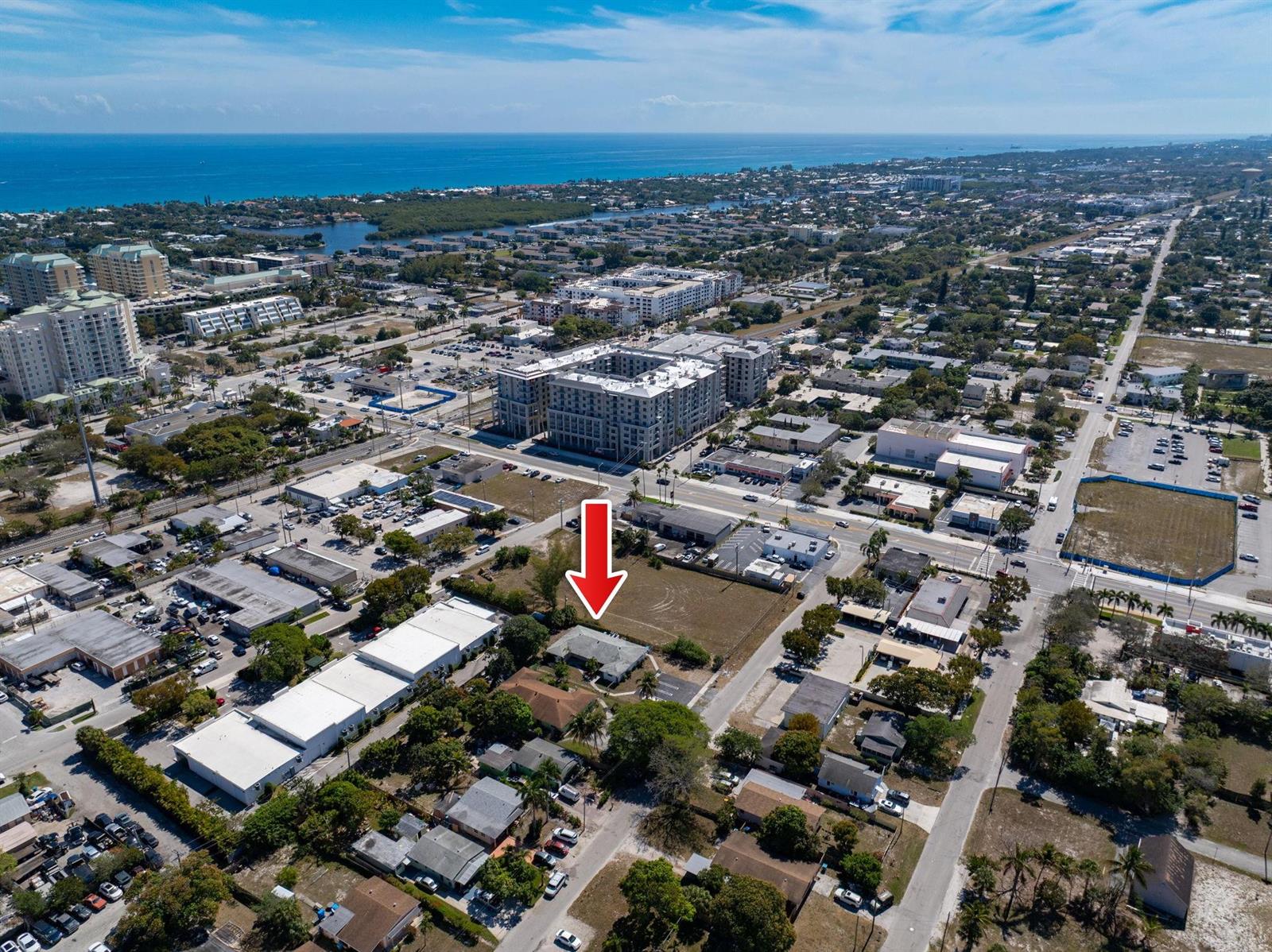 An aerial view shows a residential property with a red arrow pointing toward it — 400 NE 2nd Street, Boynton Beach FL 33435, BOYNTON BEACH, FL