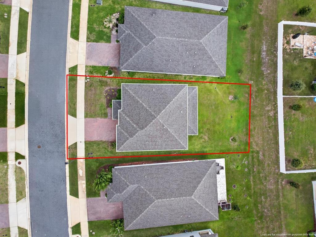 An aerial view shows a single-family home with a red-outlined property boundary — 2292 BEAR PEAK RD. ROAD, MINNEOLA, FL