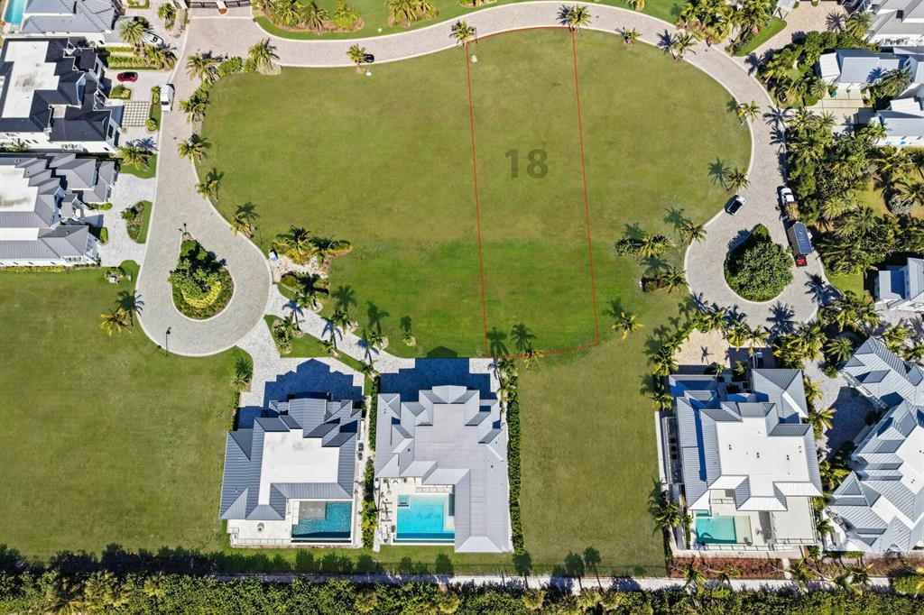 An aerial view shows a vacant lot marked 18 surrounded by houses and a road — 869 HILL TIDE LANE, BOCA GRANDE, FL