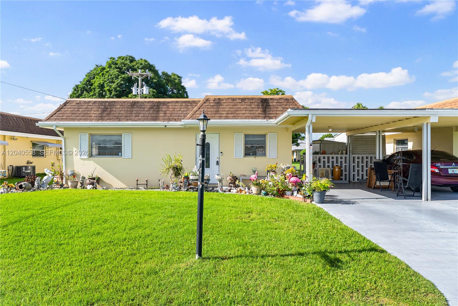 2208 Gardenia Way, Lehigh Acres FL 33936
