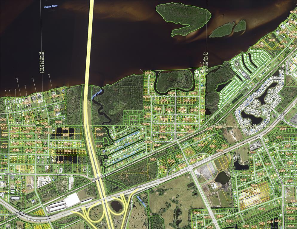 This is a satellite map showing residential neighborhoods, roads, and waterways in a coastal area — 151 GLENHOLM AVENUE, PUNTA GORDA, FL