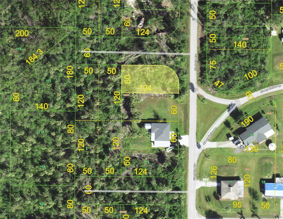 This is a map showing property lot lines and parcel numbers in a wooded area — 151 GLENHOLM AVENUE, PUNTA GORDA, FL