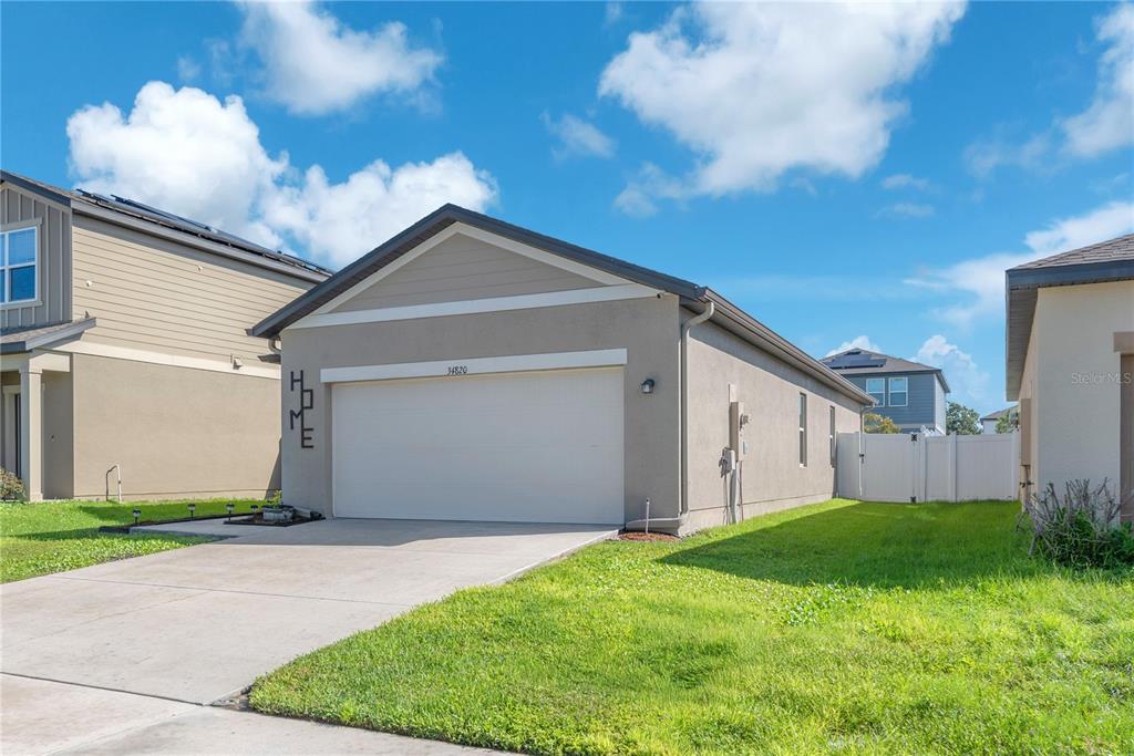 34820 DAISY MEADOW LOOP, ZEPHYRHILLS, FL — photo 2 of 30