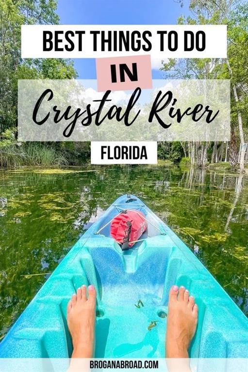 A person's feet rest inside a bright blue kayak on a green, plant-filled river — 8400 W MAYO DRIVE, CRYSTAL RIVER, FL