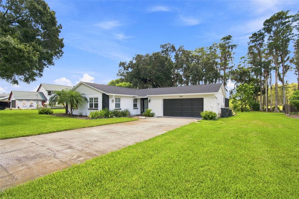 210 LAKE HOBBS ROAD, LUTZ, FL — photo 4 of 30