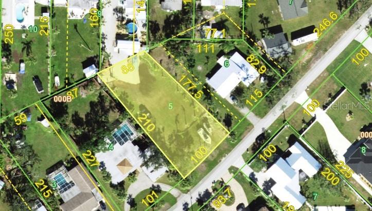 This is an aerial map showing a vacant lot highlighted in yellow — 4467 NORTHSHORE DRIVE, PUNTA GORDA, FL