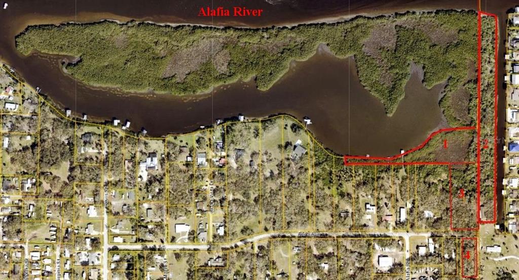 This is an aerial map showing property boundaries outlined in red along the Alafia River — 7610 ANNA AVENUE, GIBSONTON, FL