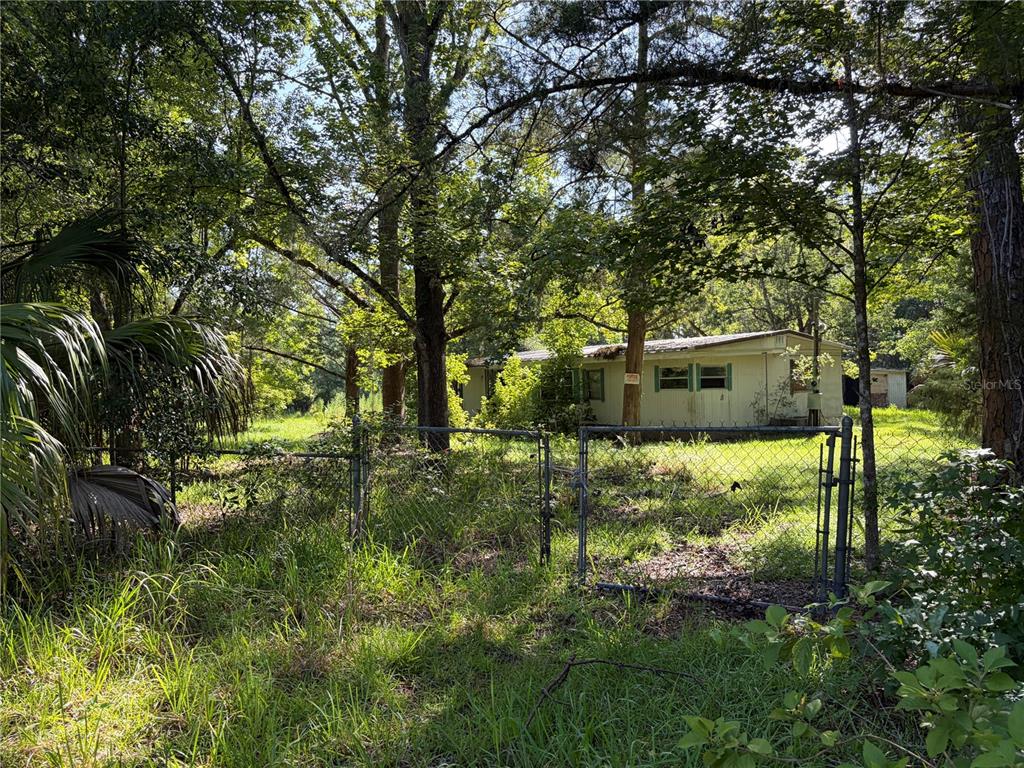 This is a property map showing a rectangular parcel of land outlined in red — 2361 NE 115TH AVENUE, SILVER SPRINGS, FL