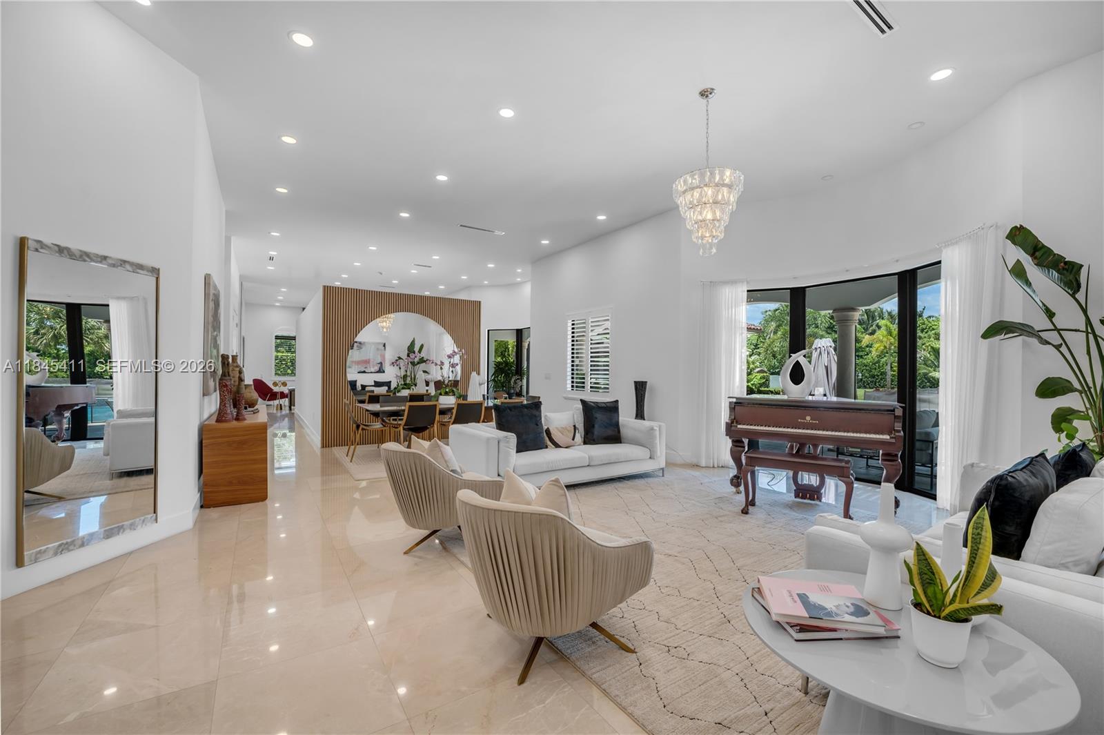 A single-story house with a tiled roof, arched entryway, and a paved circular driveway — 331 SW 124th Ave, Miami FL 33184, MIAMI, FL