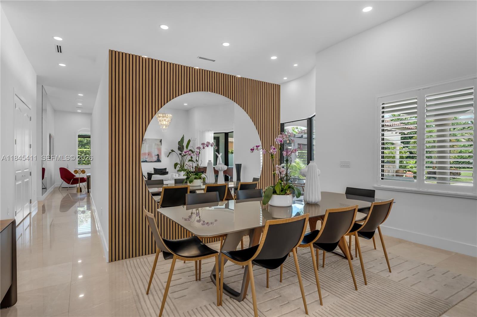 A bright living room features a grand piano, white sofas, and a wood-slatted accent wall — 331 SW 124th Ave, Miami FL 33184, MIAMI, FL