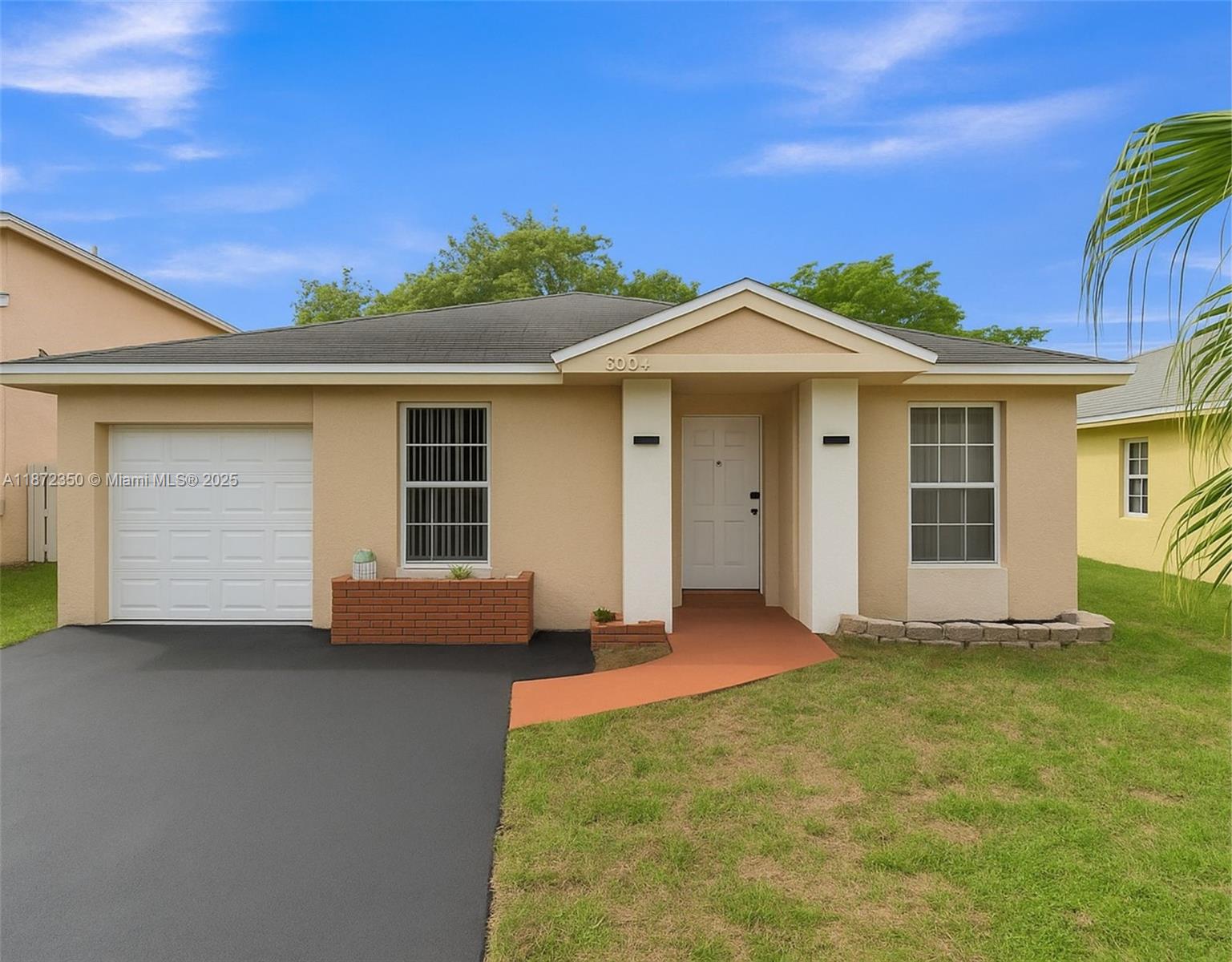 5904 Woodland Point Pl, Tamarac FL 33319