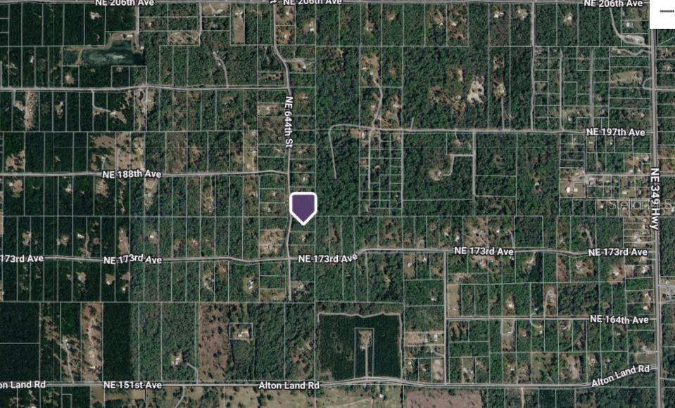 An aerial map view showing a highlighted property lot surrounded by rural roads and vegetation — NE 644TH AVE, OLD TOWN, FL