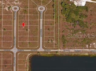 This is an aerial map view of a vacant residential lot marked with a pin — 24 CHINABERRY WAY, PLACIDA, FL