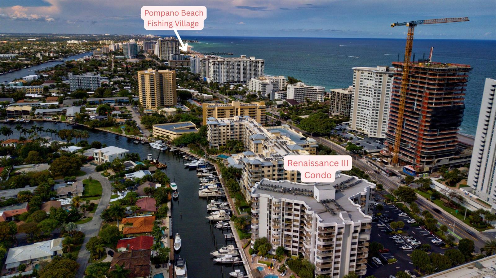 Aerial view of a coastal neighborhood featuring a canal, residential buildings, and a construction site — 1361 South Ocean # 808, Pompano Beach FL 33062, POMPANO BEACH, FL