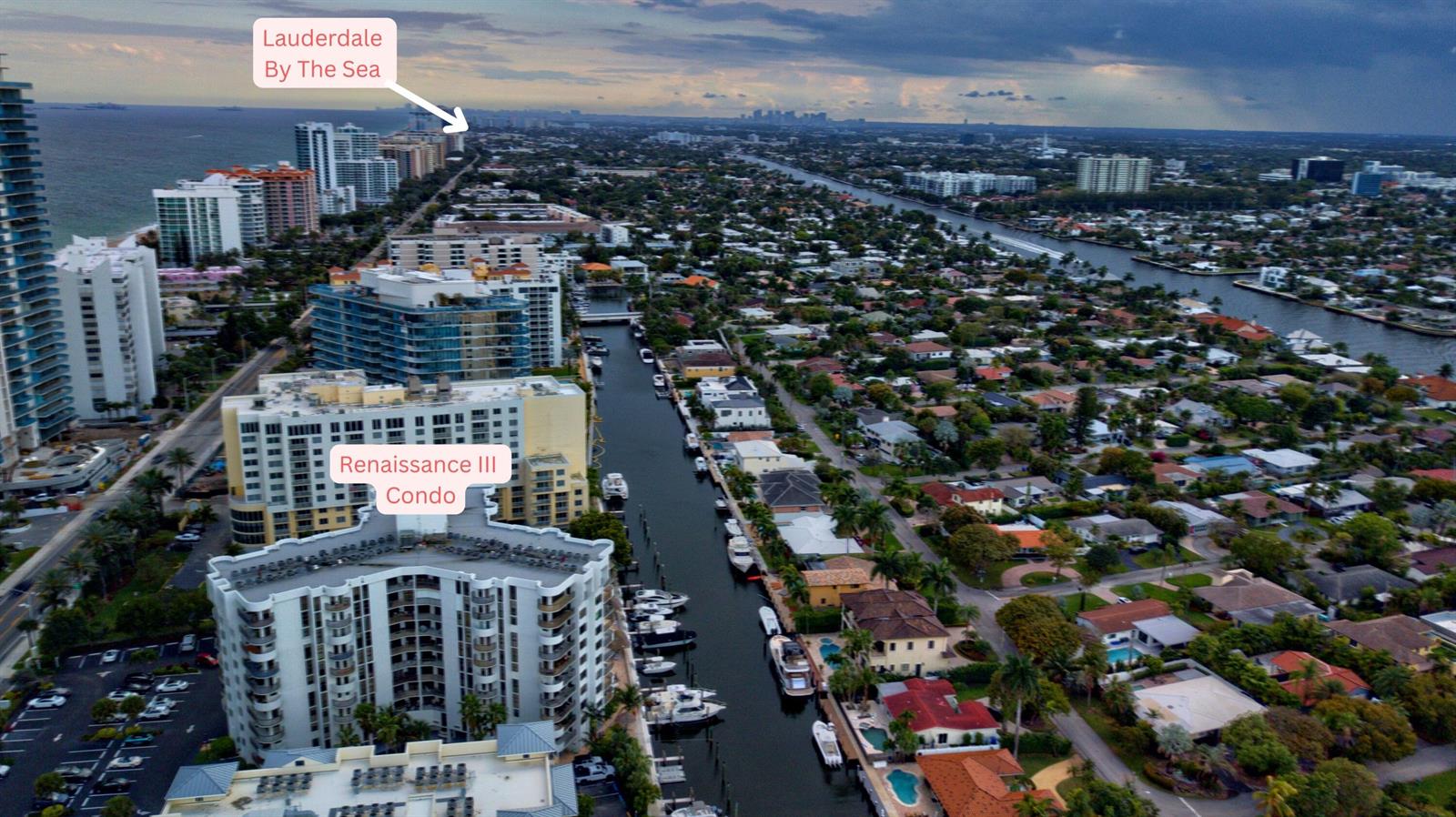 Aerial view of a waterfront condominium building with a canal and residential neighborhood nearby — 1361 South Ocean # 808, Pompano Beach FL 33062, POMPANO BEACH, FL