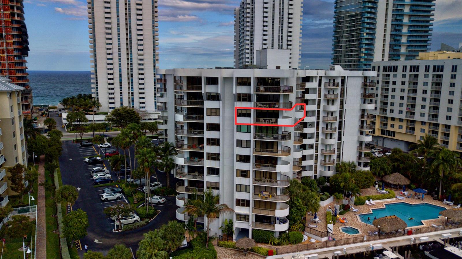An aerial view of a white residential building with a red outline highlighting a balcony — 1361 South Ocean # 808, Pompano Beach FL 33062, POMPANO BEACH, FL