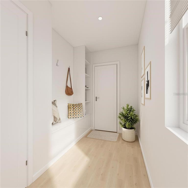 This is a rendering of a minimalist entryway featuring a built-in bench and light wood flooring — 241 BREEZEWAY DRIVE, DAVENPORT, FL
