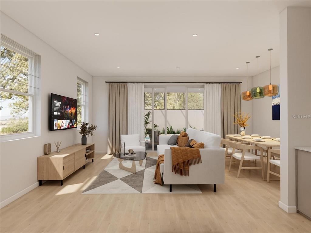 This is a digital rendering of an open-concept living and dining area with light wood floors — 241 BREEZEWAY DRIVE, DAVENPORT, FL
