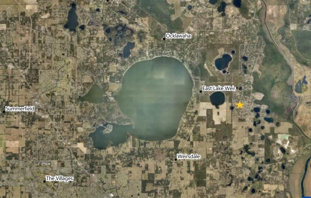 This is a satellite map showing Lake Weir and surrounding communities in Florida — MALAUKA RADIAL, OCKLAWAHA, FL