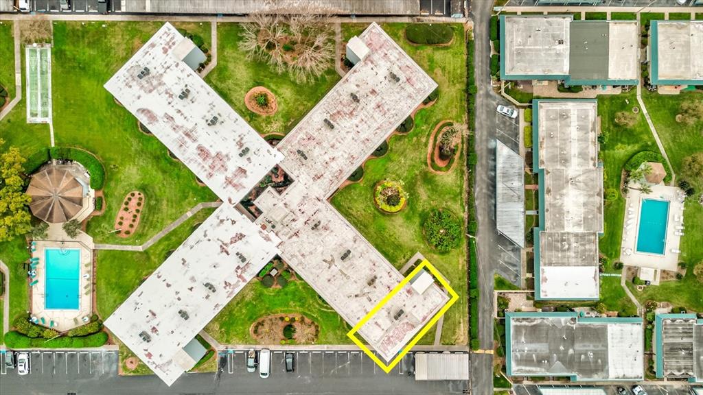An aerial view of a residential complex with a highlighted apartment building section — 333 LAKE HOWARD DR NW UNIT 314D, WINTER HAVEN, FL
