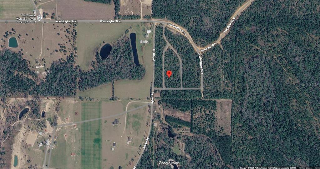 This is a satellite map view showing a vacant lot marked with a red pin — Lot 8 Unit 14 Blk 1298 DARLENE AVENUE, CHIPLEY, FL