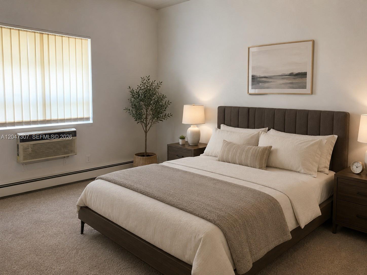 A bedroom features a queen bed with a dark headboard, nightstands, and a window unit — 790 E 6th Pl, Hialeah FL 33010, HIALEAH, FL