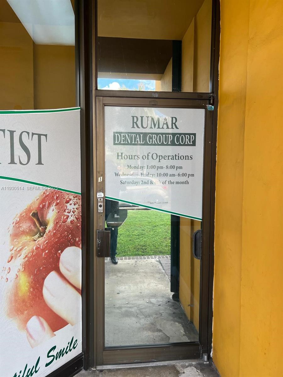 A glass door displays the business name and operating hours for Rumar Dental Group Corp — 4750 NW 7 ST, Miami FL 33126, MIAMI, FL