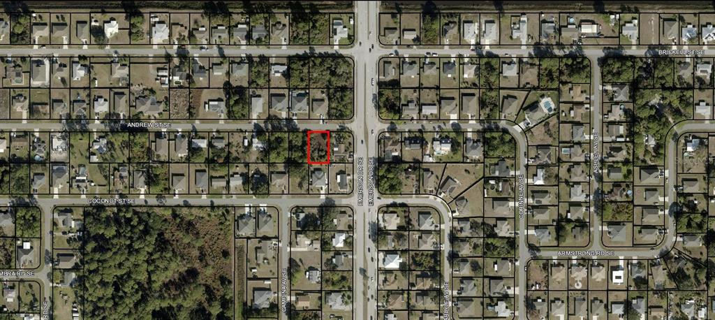 An aerial map view shows a vacant residential lot highlighted in red within a neighborhood — 840 ANDREW STREET SE, PALM BAY, FL