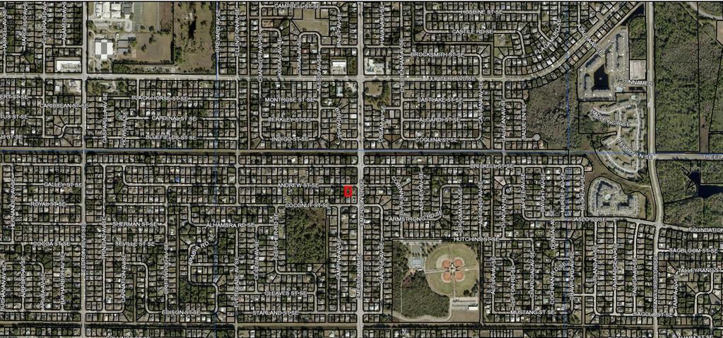 This is an aerial map view of a residential neighborhood with a highlighted property — 840 ANDREW STREET SE, PALM BAY, FL