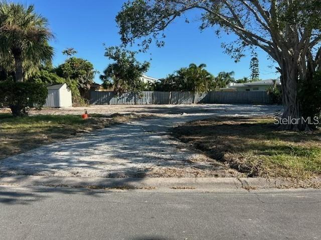 A vacant, cleared residential lot with a gravel driveway and a small shed — 3615 BELLE VISTA DRIVE E, ST PETE BEACH, FL