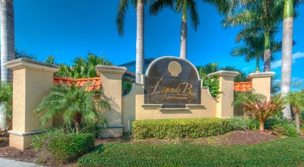 The entrance sign for Legends Bay at IMG Academies features palm trees and landscaping — 5815 INSPIRATION TERRACE, BRADENTON, FL