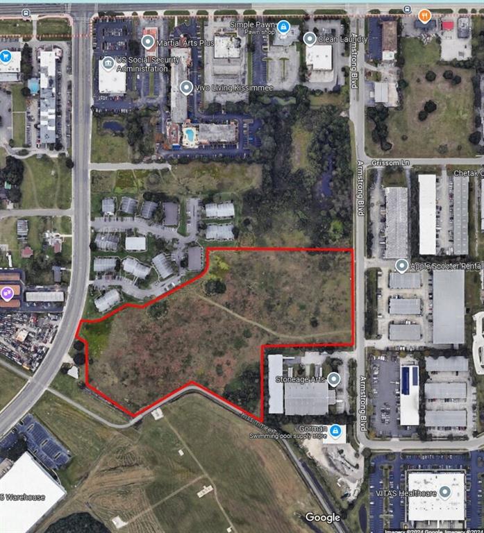 An aerial map view shows a vacant, irregularly shaped plot of land outlined in red — 0 ARMSTRONG BOULEVARD, KISSIMMEE, FL