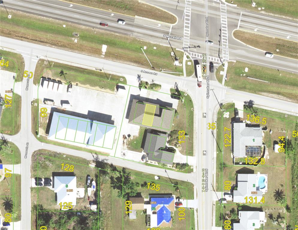 This is an aerial map showing commercial and residential properties near a road intersection — 3579 S ACCESS ROAD UNIT D, ENGLEWOOD, FL
