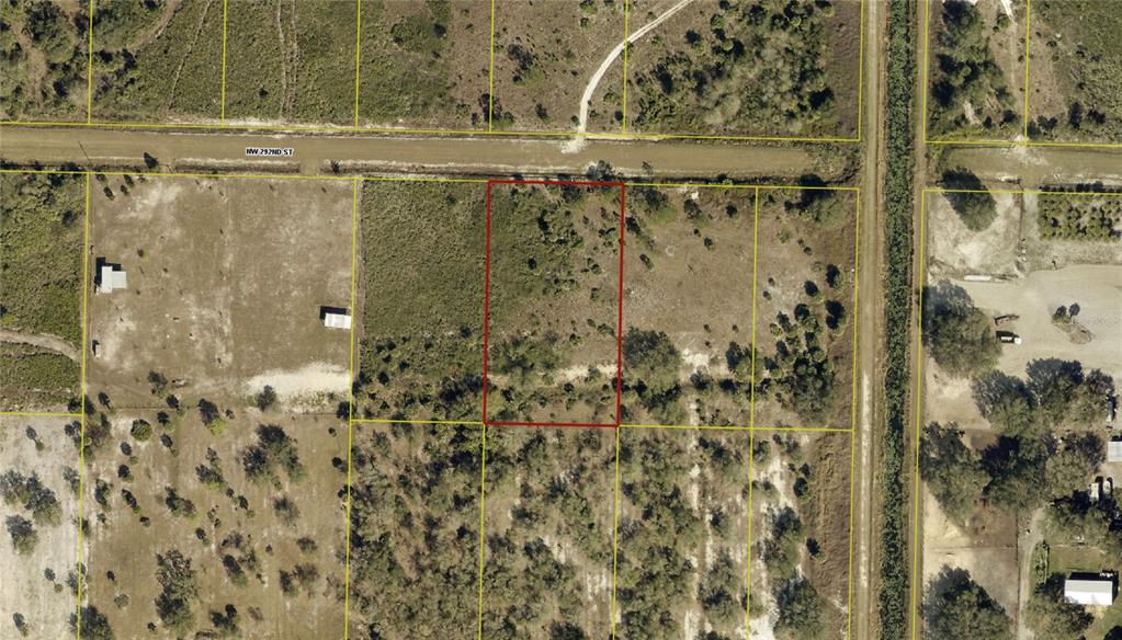 An aerial view shows a rectangular plot of land outlined in red near a road — 16914 NW 292ND STREET, OKEECHOBEE, FL