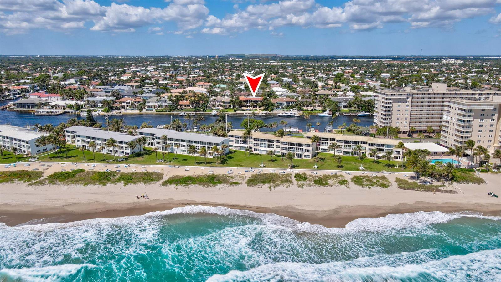 An aerial view shows a beach, a multi-story apartment complex, and a canal with houses — 3870 NE 31st Avenue, Lighthouse Point FL 33064, LIGHTHOUSE POINT, FL