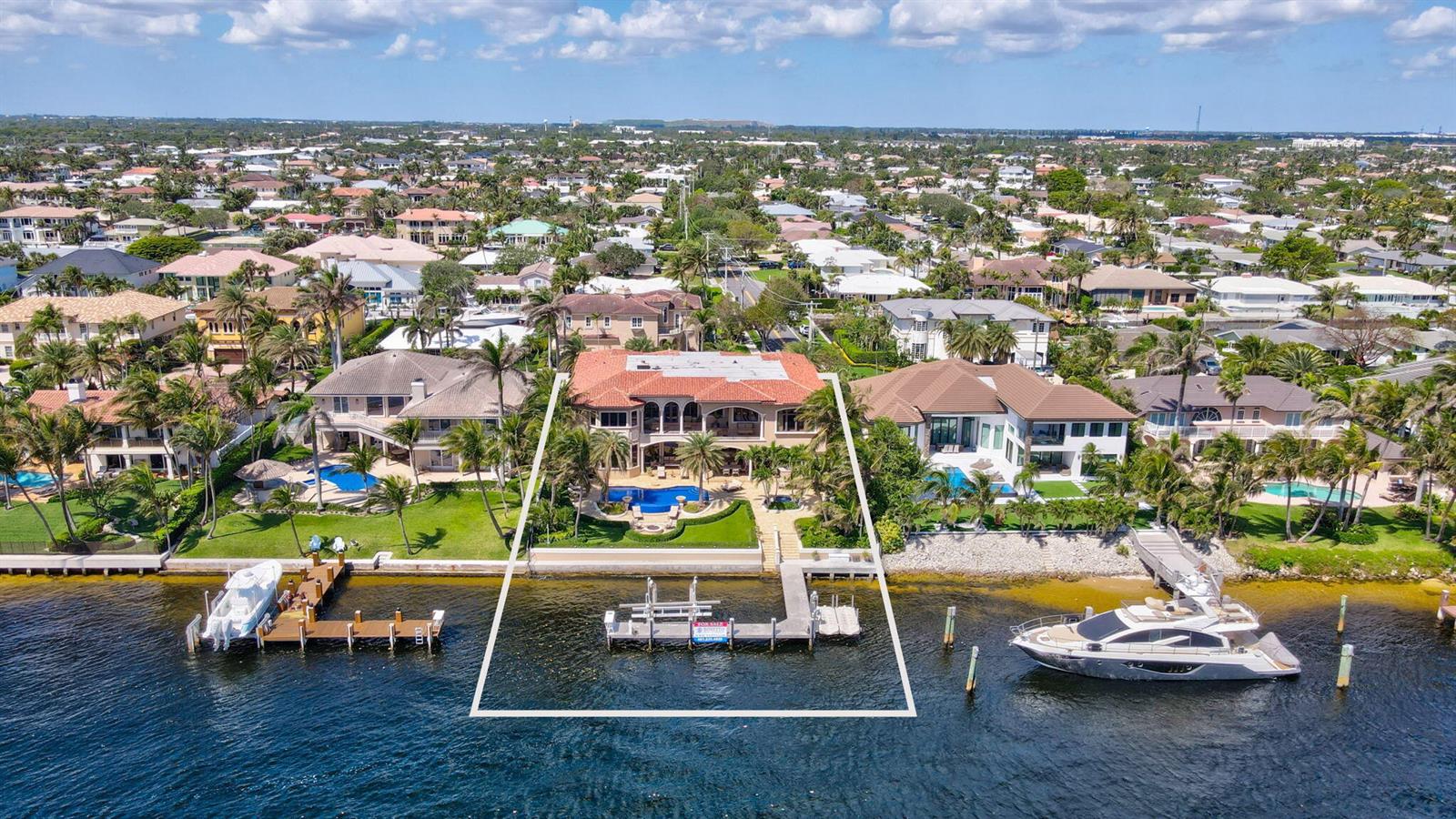 An aerial view of a waterfront mansion with a private dock and swimming pool — 3870 NE 31st Avenue, Lighthouse Point FL 33064, LIGHTHOUSE POINT, FL