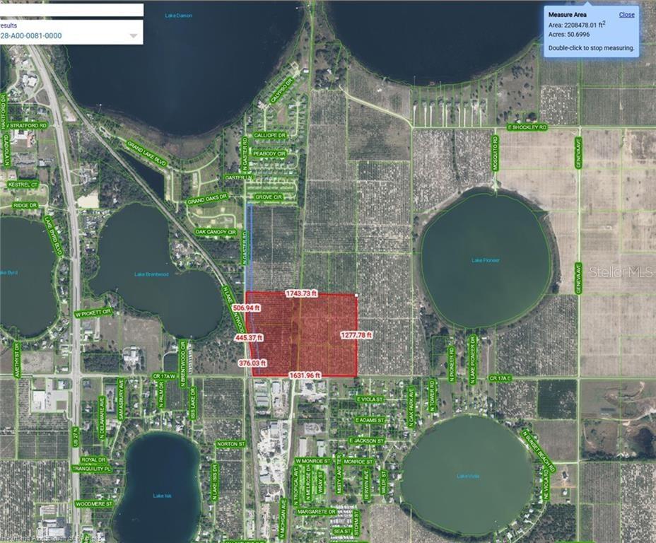 An aerial map shows a large, rectangular parcel of land highlighted in red — 298 COUNTY ROAD 17A W, AVON PARK, FL