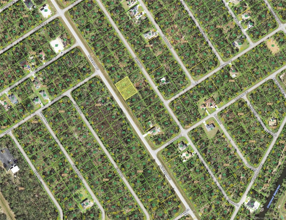 This is an aerial map showing a highlighted vacant lot in a residential neighborhood — 1756/ 1764 BISCAYNE DRIVE, PORT CHARLOTTE, FL