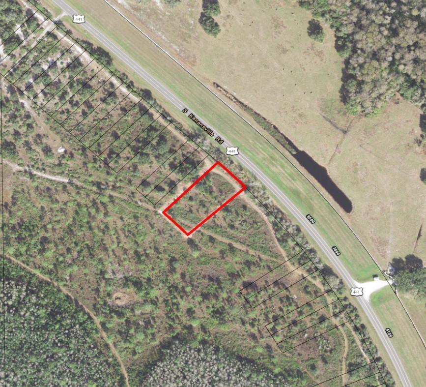 An aerial map view shows a rectangular plot of land outlined in red along a highway — 0 Kenansville, Okeechobee FL 34739, OKEECHOBEE, FL