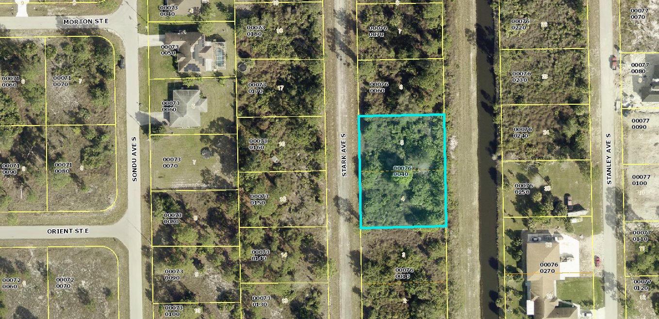 This is a map showing a highlighted vacant lot located along a paved road — 655 Stark Avenue S, Lehigh Acres FL 33974, LEHIGH ACRES, FL